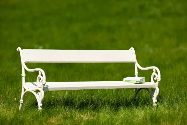 stock image Spring and summer - White romantic bench in meadow