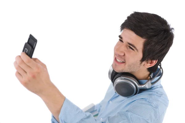 Férfi hallgató bevétel fénykép-val mozgatható telefon — Stock Fotó