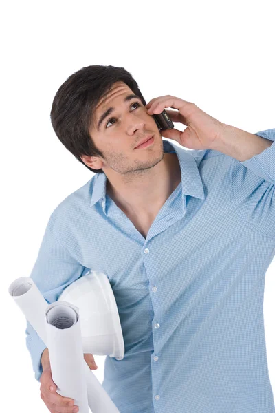 Male architect student with helmet and plans calling — Stock Photo, Image