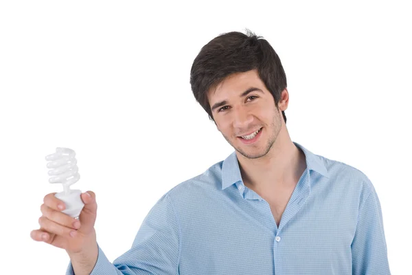 Souriant Jeune Homme Tenant Ampoule Économie Énergie Sur Fond Blanc — Photo