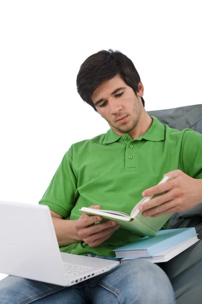 Студент Молодий Чоловік Книгою Читання Ноутбуків Сидить Мішку Бобами Білому — стокове фото