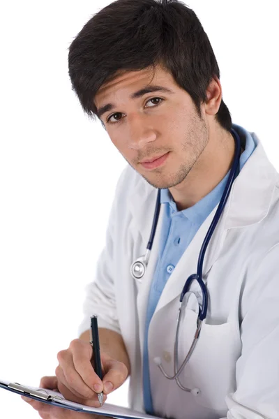 白い背景の上を書く聴診器で男子学生医師 — ストック写真