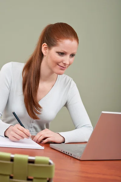 Long red hair business woman at office Stock Photo