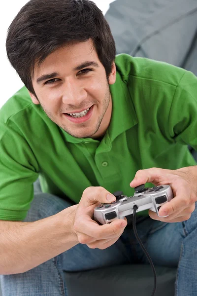 Junger Glücklicher Mann Spielt Videospiel Mit Steuerpad Auf Weißem Hintergrund Stockbild