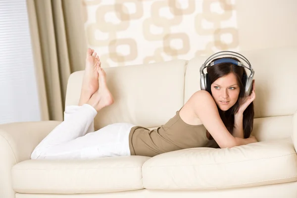 Happy Woman Headphones Lying Sofa Lounge Listen Music — Stock Photo, Image