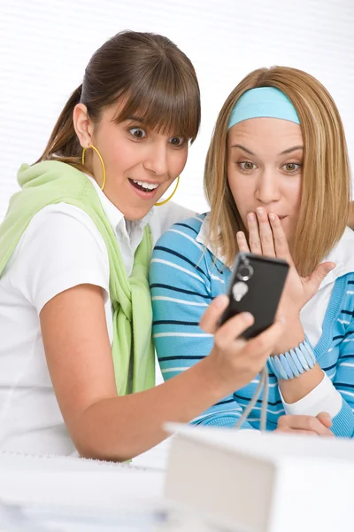 Two young woman with camera — Stock Photo, Image