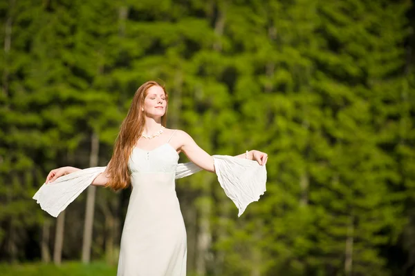 Beautiful romantic woman in summer sunny nature — Stock Photo, Image
