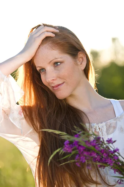 Long Red Hair Woman Romantic Sunset Meadow Holding Bunch Flowers — Stock Photo, Image