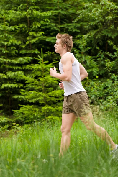 Ung Man Jogging Naturen Sportig Outfit — Stockfoto
