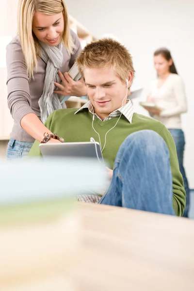 Touch screen tablet computer - students in library — Stock Photo, Image