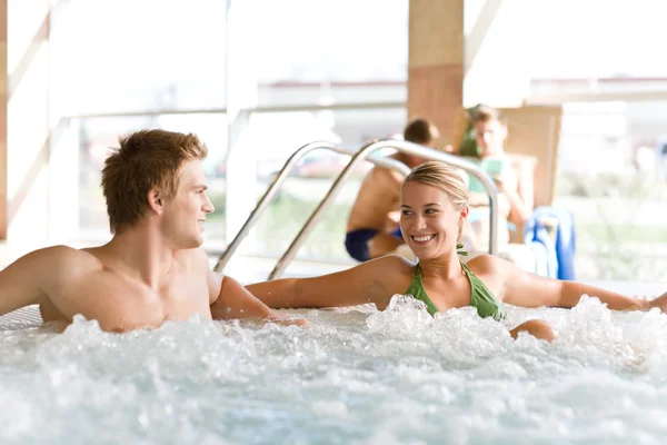 Swimming pool - couple relax in hot tub — Stock Photo, Image