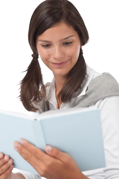 Portrait of teenager reading book — Stock Photo, Image
