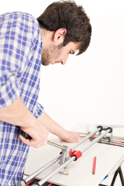 Mejora del hogar - handyman azulejo de corte —  Fotos de Stock