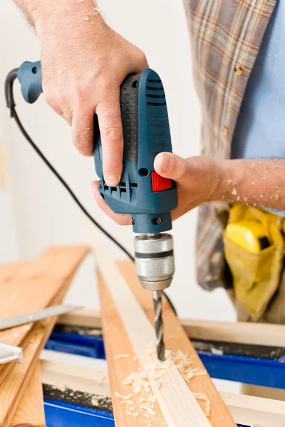Home improvement - handyman drilling wood — Stock Photo, Image
