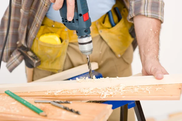 Home improvement - handyman drilling wood — Stock Photo, Image