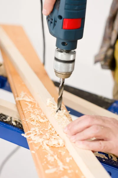 Mejora del hogar - manitas de perforación de madera — Foto de Stock
