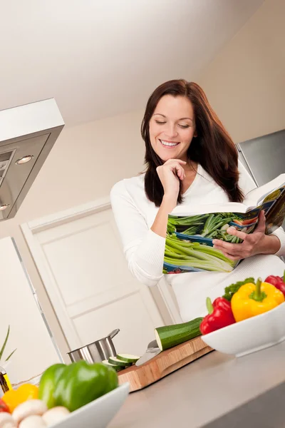 Young Woman Reading Cookbook Kitchen Looking Recipe — Stock Photo, Image