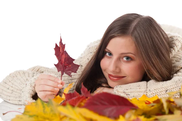 Autumn portrait of beautiful woman with leaf wearing turtleneck — Stock Photo, Image