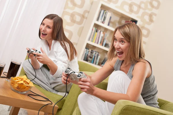 Students - Two happy female teenager playing TV game — Stock Photo, Image