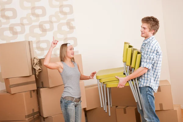 Moving House Man Woman Box Chair Woman Pointing — Stock Photo, Image