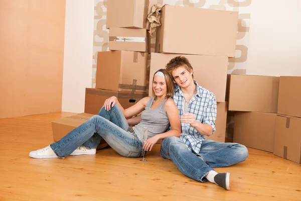 Moving House Happy Couple Celebrating Glass Champagne New Home — Stock Photo, Image