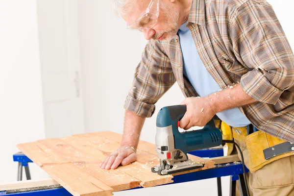 Home Improvement Handyman Cut Wood Jigsaw Workshop Stock Photo