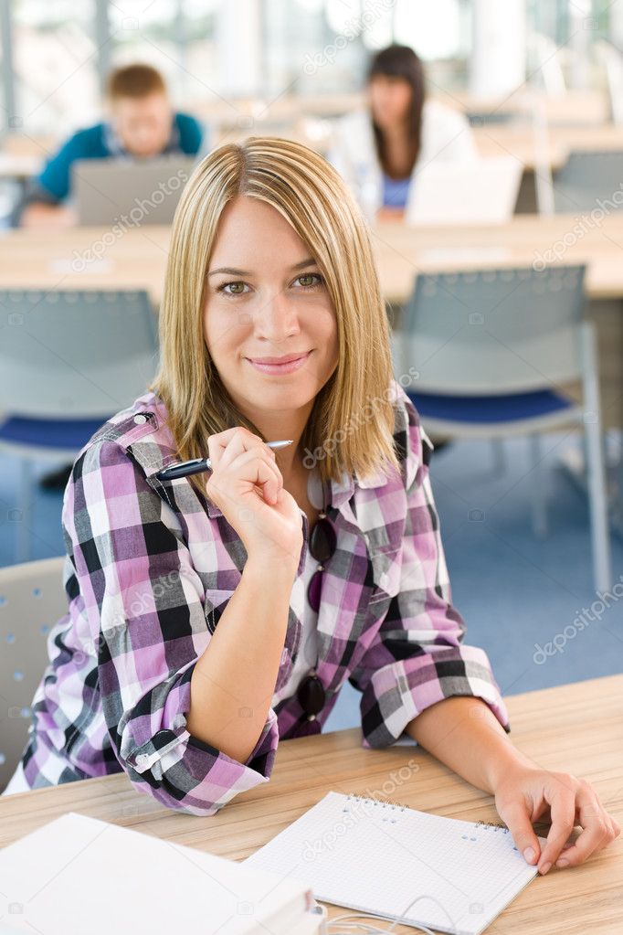 Happy smiling student study in classroom at university