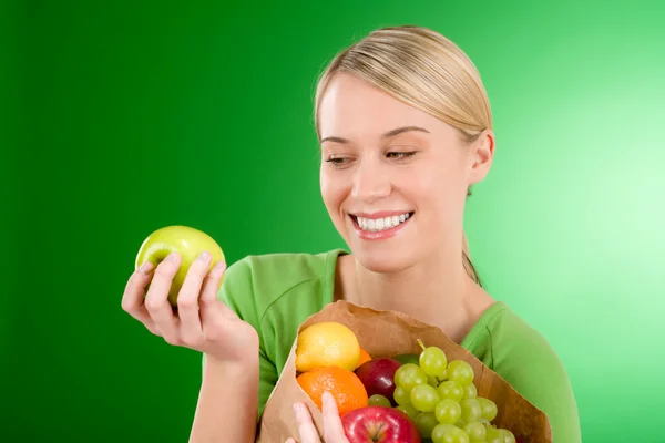 Healthy lifestyle - woman with fruit shopping paper bag — Stock Photo, Image