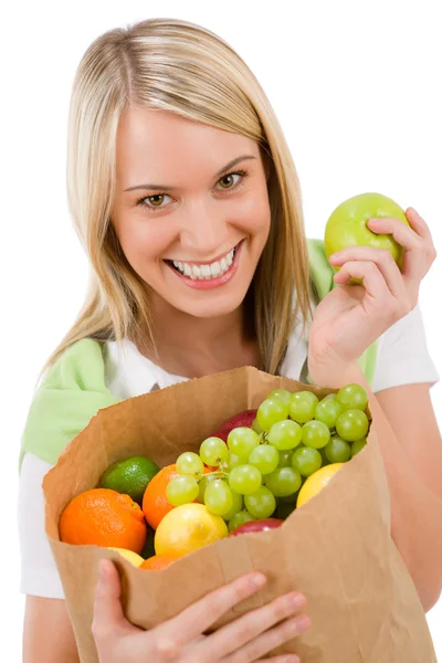 Healthy lifestyle - cheerful woman with fruit shopping bag — Stock Photo, Image