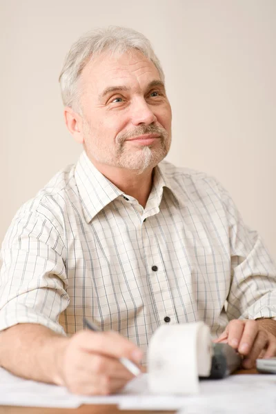 Senior mature man - home office paper tape calculator — Stock Photo, Image
