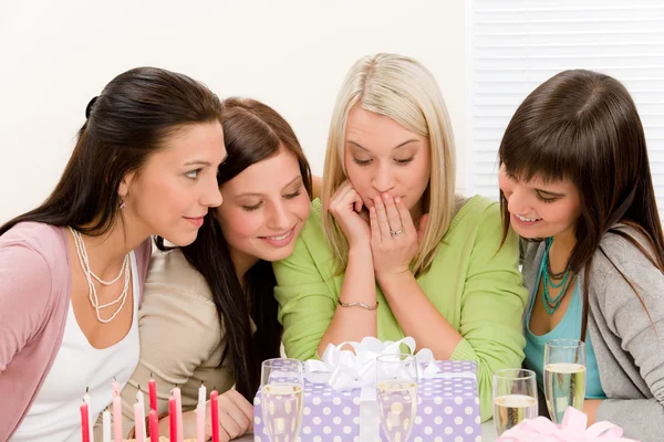 Birthday party - surprised woman getting present — Stock Photo, Image