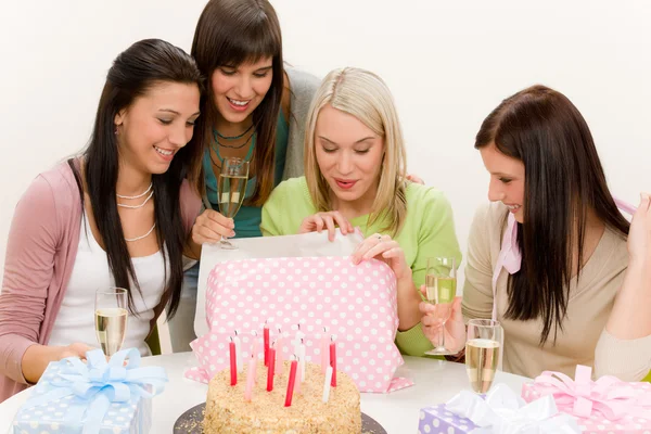 Birthday party - woman unwrap present, celebrating — Stock Photo, Image