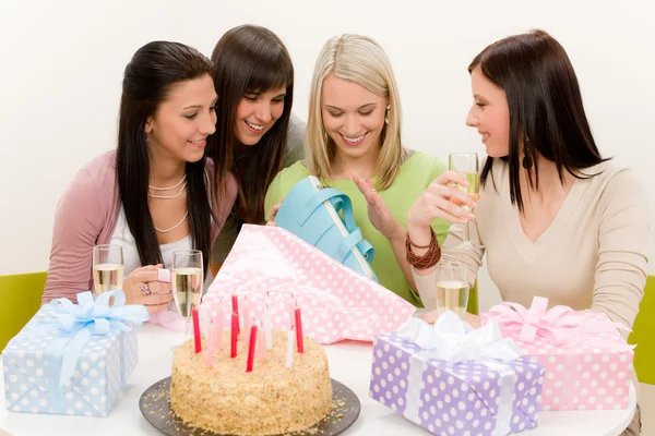Birthday party - woman unwrap present, celebrating — Stock Photo, Image