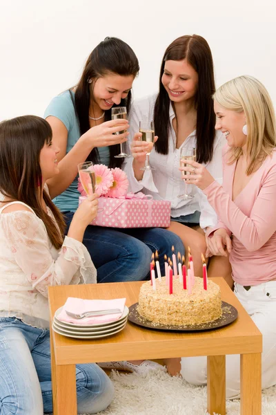 Birthday party - woman getting present and flower — Stock Photo, Image