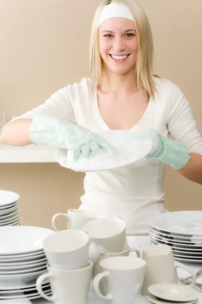 Modern kitchen - happy woman washing dishes — Stock Photo, Image