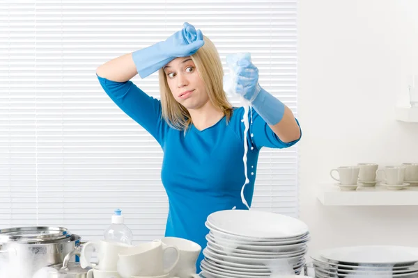 Modern kitchen - frustrated woman washing dishes — Stock Photo, Image