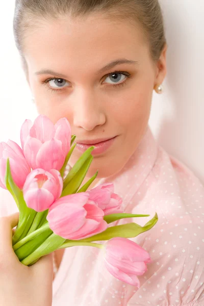 Fashion - young romantic woman with spring tulips — Stock Photo, Image