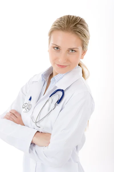Doctora joven con estetoscopio en blanco —  Fotos de Stock