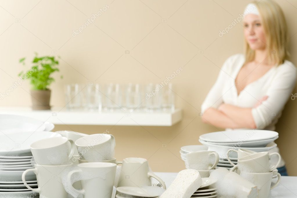 Modern kitchen - happy woman having break