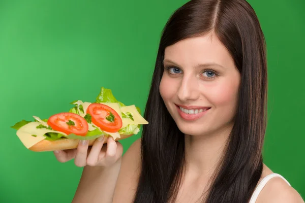 Υγιεινού τρόπου ζωής - γυναίκα απολαύσετε σάντουιτς με τυρί — Φωτογραφία Αρχείου
