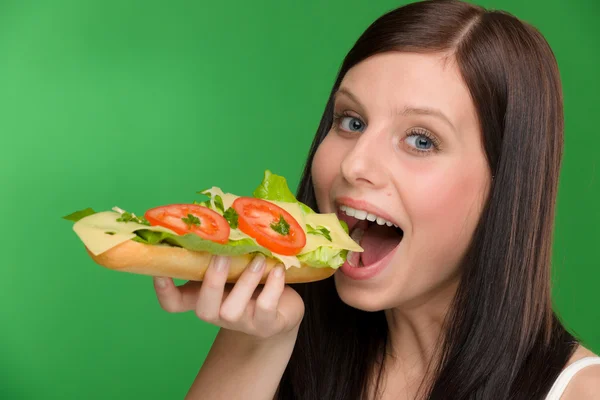 Healthy lifestyle - woman bite cheese sandwich — Stock Photo, Image