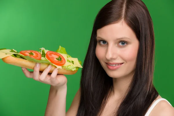 Hälsosam livsstil - kvinna njuta ostsmörgås — Stockfoto