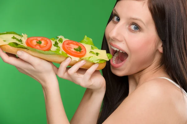 Healthy lifestyle - woman enjoy cheese sandwich — Stock Photo, Image