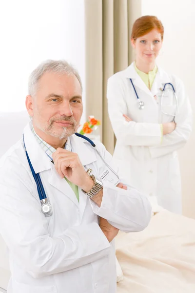 Medical team - portrait two doctor in hospital — Stock Photo, Image