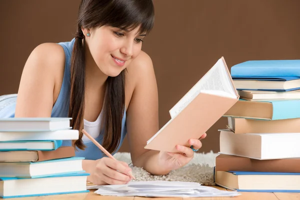 Home study - woman teenager write notes — Stock Photo, Image