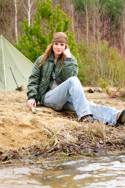 Camping woman tent nature sitting stream — Stock Photo, Image