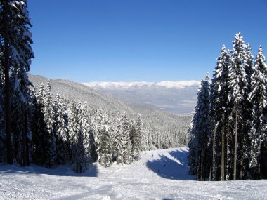 Skiing slope in Bansko, Bulgaria clipart