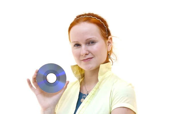 Rousse jeune femme tenant un CD — Photo
