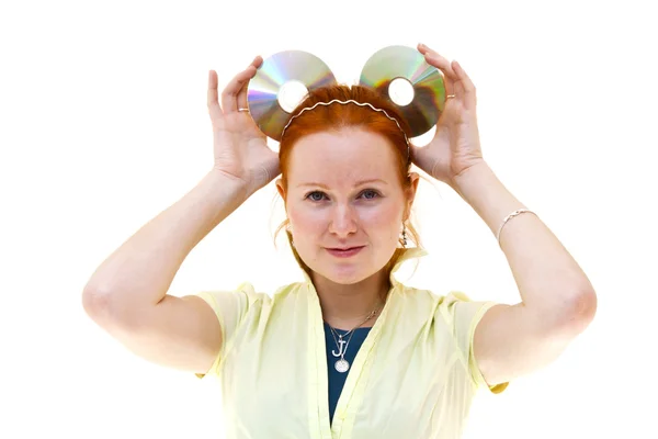 Redhead young woman holding a CDs — Stock Photo, Image