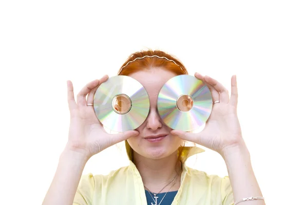 Рыжая девушка с компакт-диском — стоковое фото